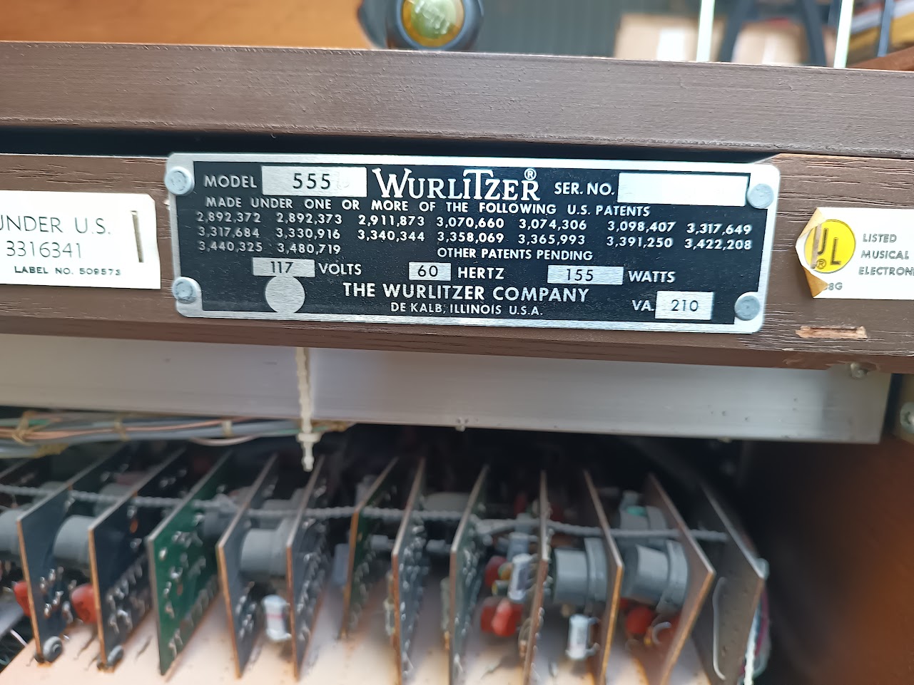 Rear nameplate showing model, electrical ratings, and patent numbers